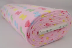 Coral Fleece – Colorful bows on pink
