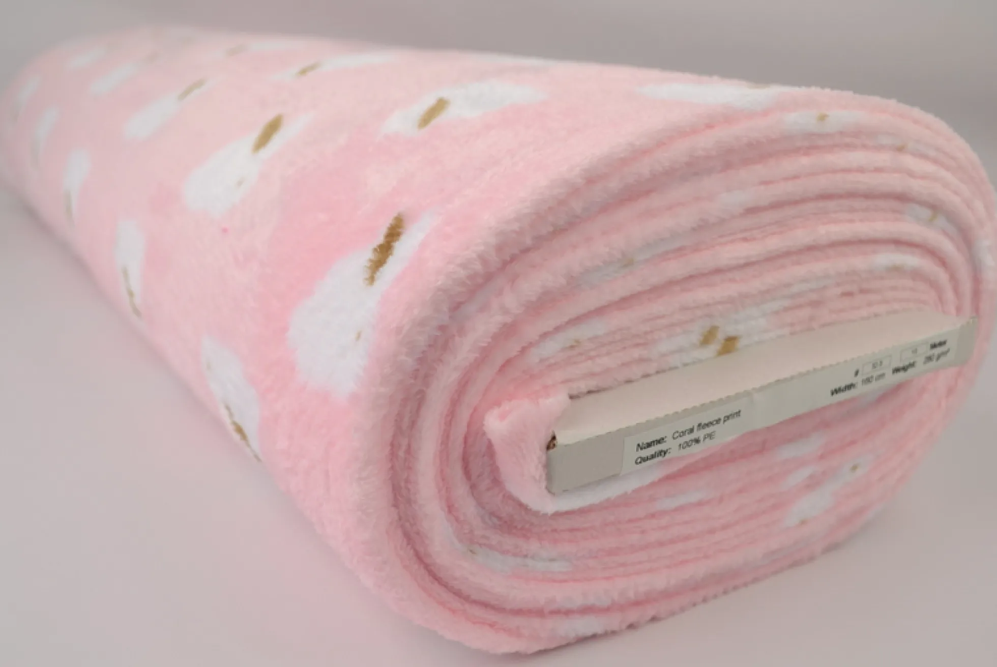Coral Fleece – White rabbits on pink