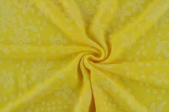 Coupon 110cm x 150cm | Jacquard jersey – Flowers geel