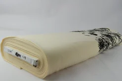 Coupon 150cm x 145cm | Viscose stretch crêpe – Zwarte bloem op champagne randdesign
