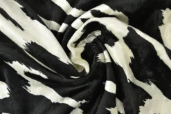 Fluweel stretch – Faded spots offwhite