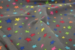 French terry – Colorful stars on dark grey