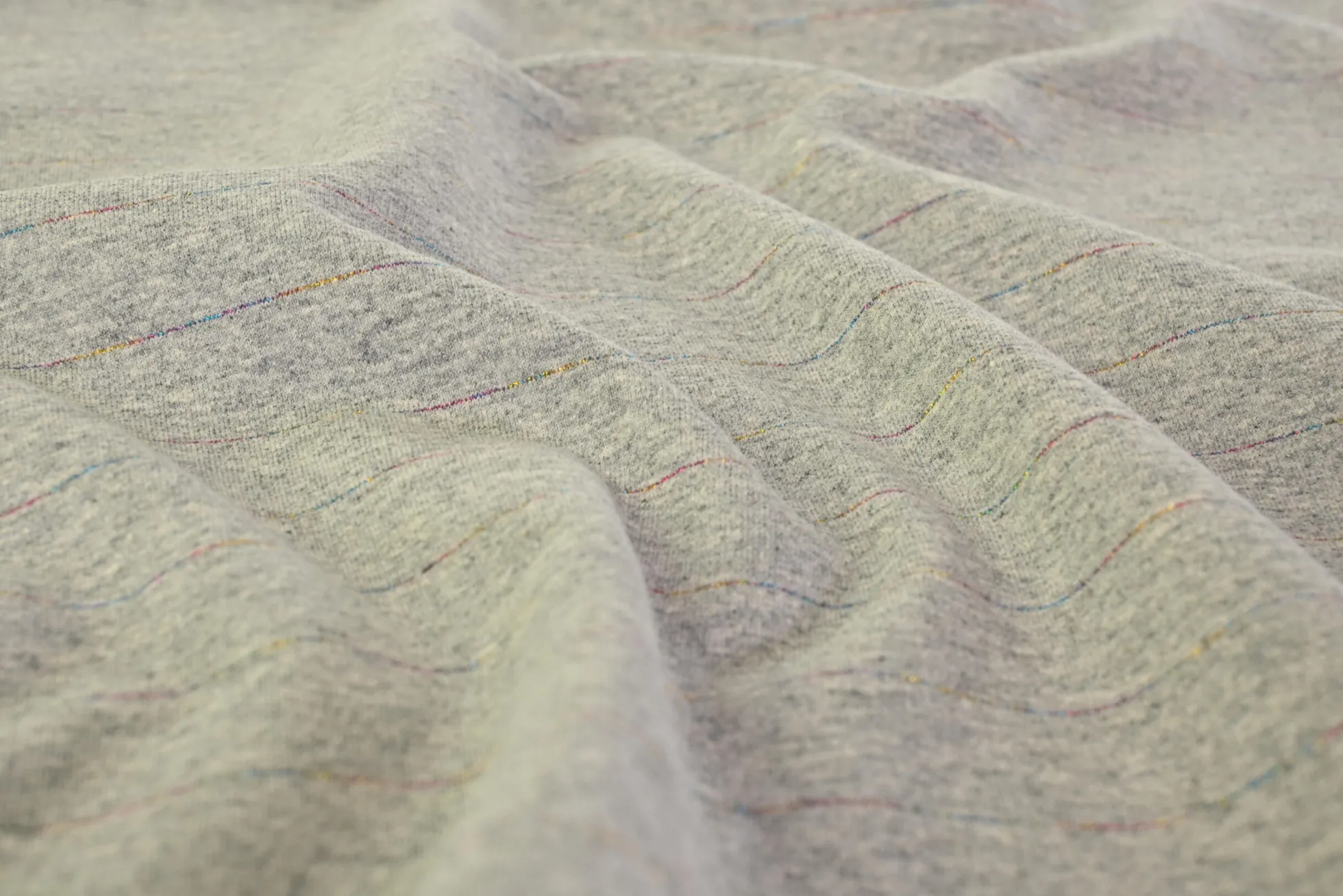 French terry – Rainbow lines on grey melange