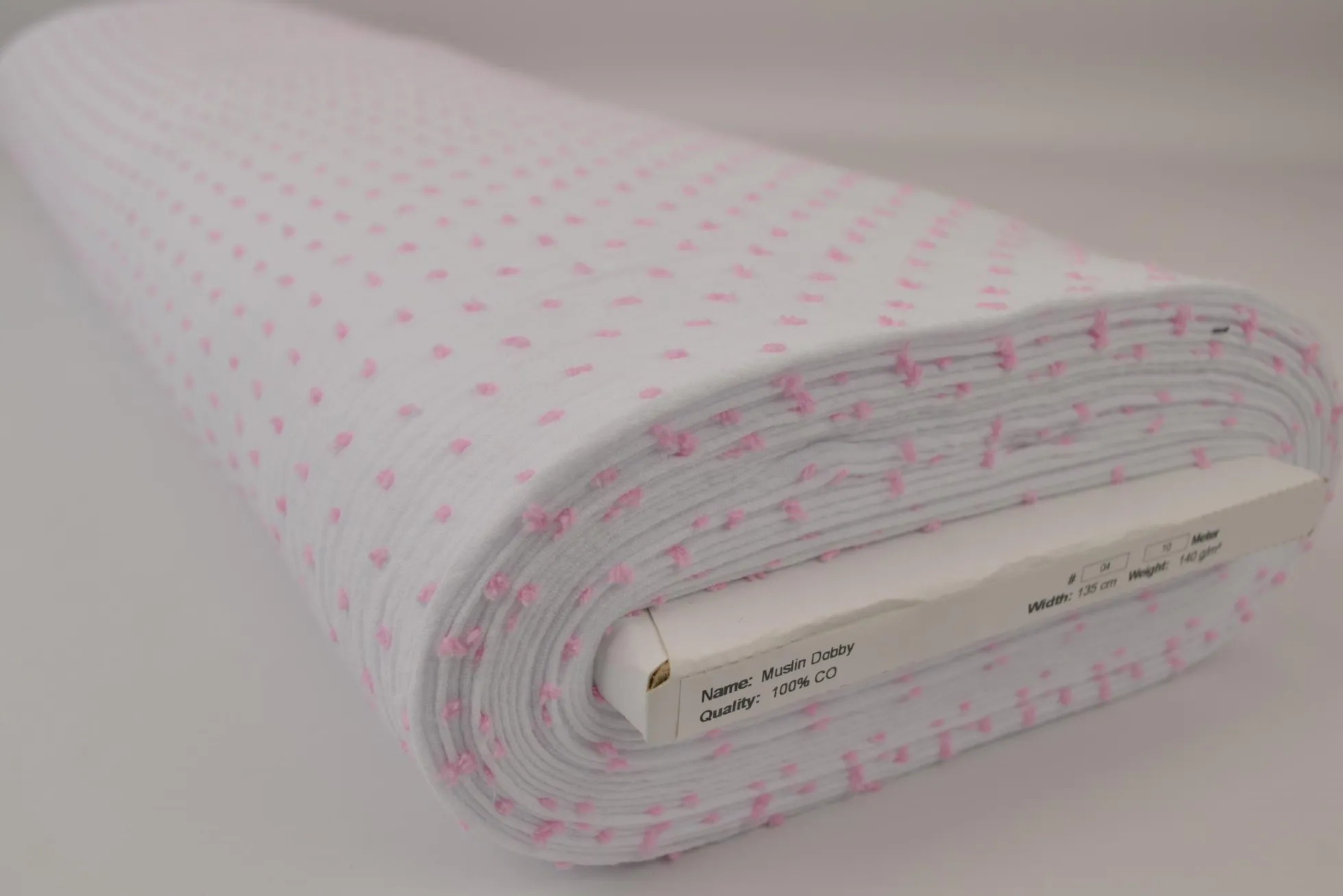 Hydrofiel / Mousseline dobby – Wit met baby roze stippen