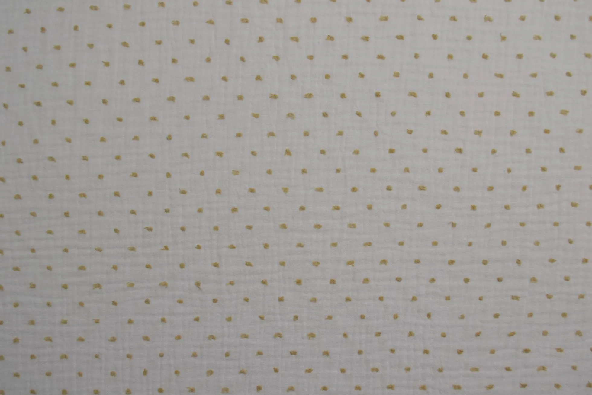 Hydrofiel / Mousseline dobby – Wit met beige stippen