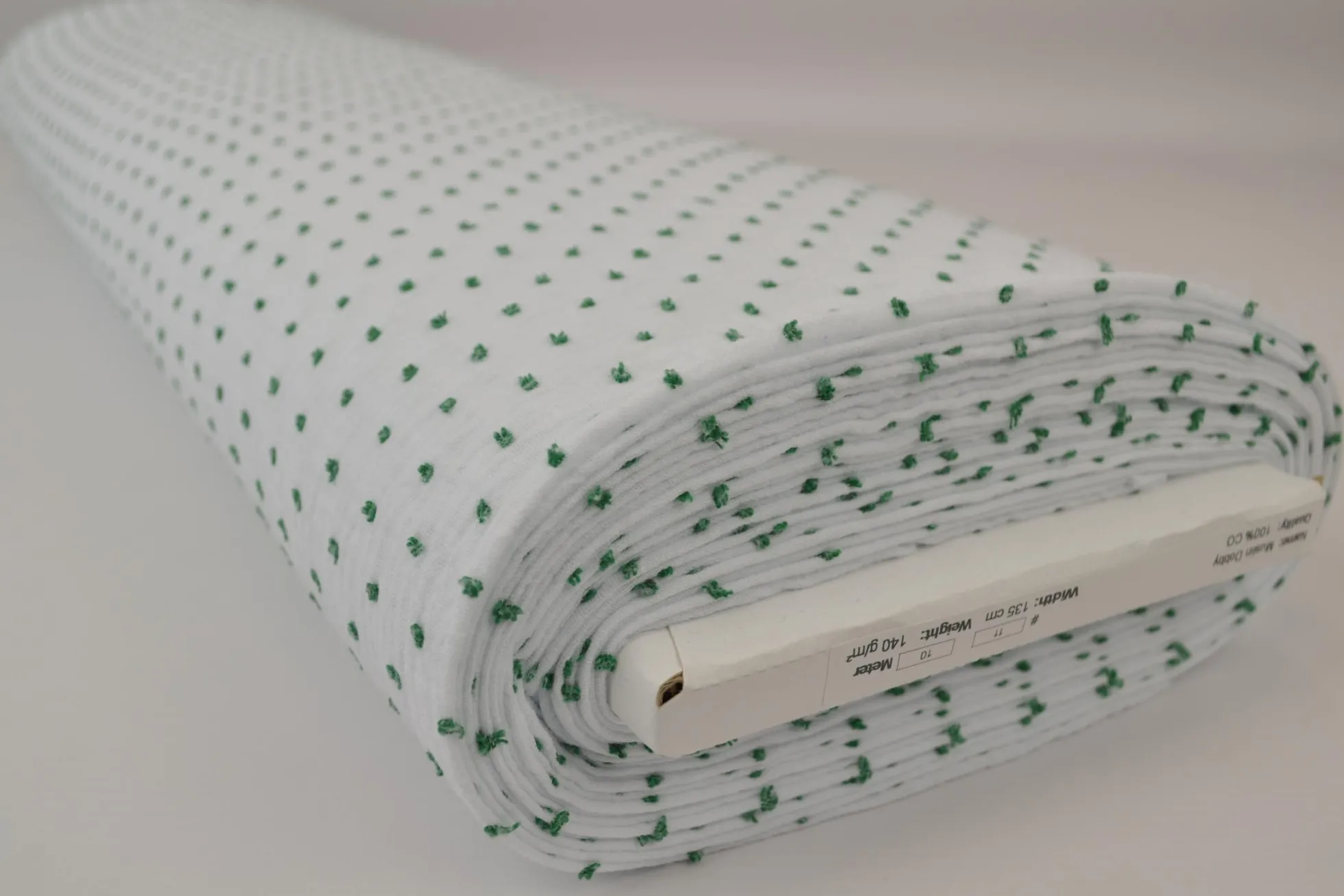 Hydrofiel / Mousseline dobby – Wit met groene stippen