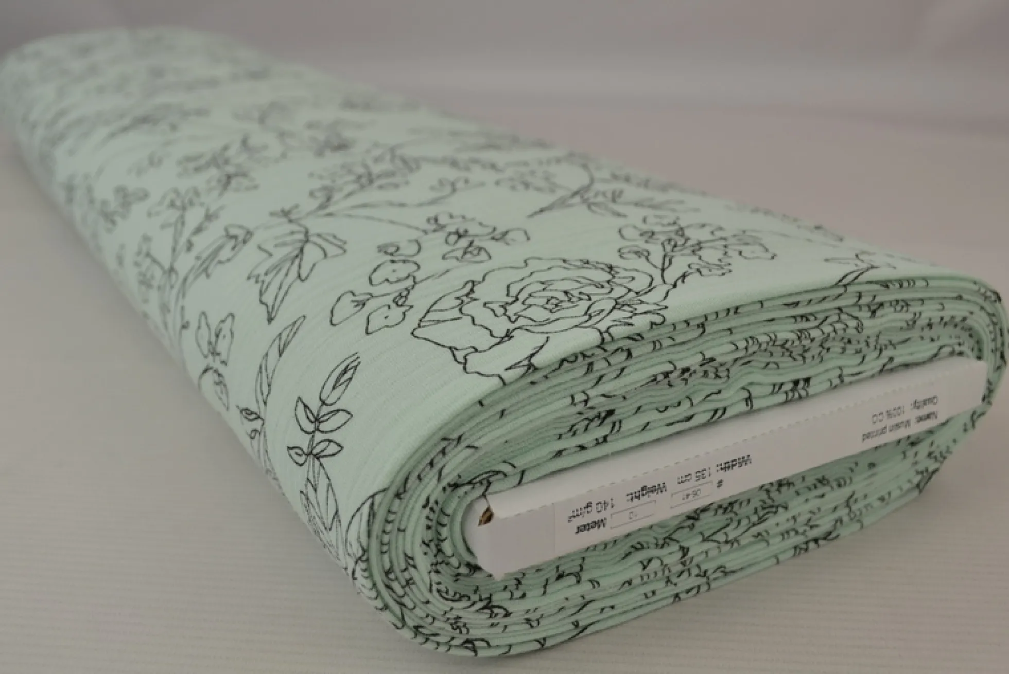Hydrofiel / Mousseline – Floral lijntekening licht mint