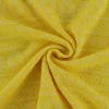 Jacquard jersey – Flower lines geel – Rol 15m x 150cm
