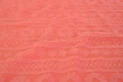 Jacquard jersey – Flower lines koraalroze