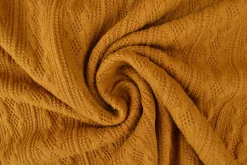 Jacquard jersey kabel – Donker oker