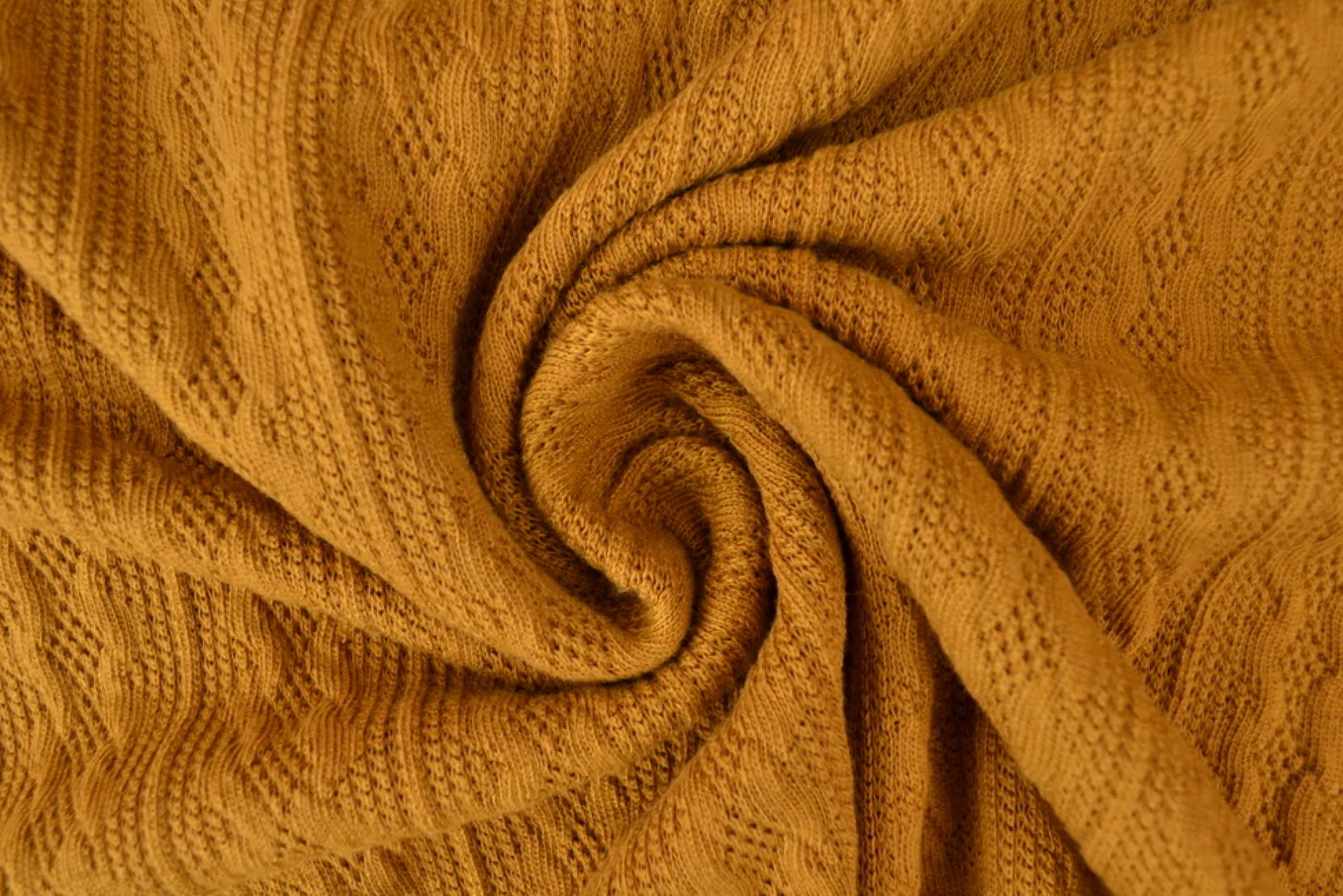 Jacquard jersey kabel – Donker oker