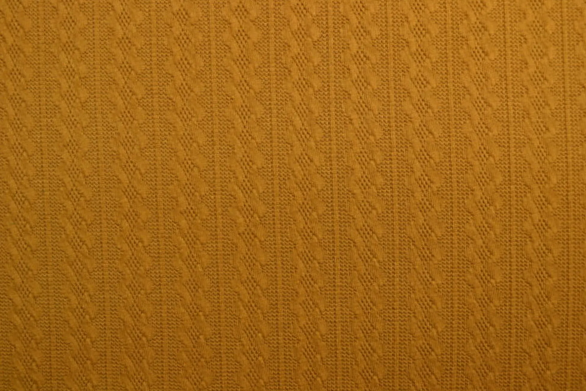 Jacquard jersey kabel – Donker oker