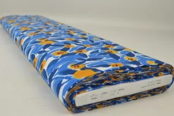 Katoen poplin  – Bladeren fantasie blauw en okergeel