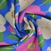 Katoen poplin – Bloem en bladeren blauw en roze