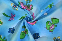 Katoen poplin – Happy dino on blue