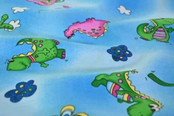 Katoen poplin – Happy dino on blue