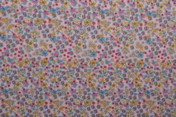 Katoen poplin – Kleine kleurrijke bloemenmix op oudroze