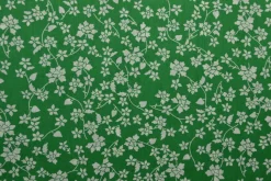 Katoen poplin – Puntige bloemen wit op groen