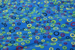 Katoen tricot – Colorful circles on blue