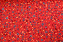 Katoen tricot – Colorful circles on red