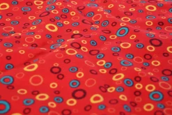 Katoen tricot – Colorful circles on red