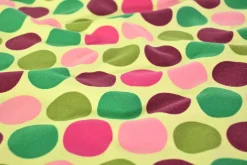 Katoen tricot – Colorful dots on bright yellow