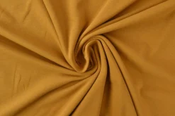 Katoen tricot: Donker okergeel