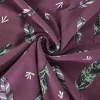 Katoen tricot – Feathers on aubergine
