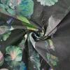 Katoen tricot – Iridescent Blue Bloom Black