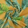 Katoen tricot – Wow – Palmbladeren oker geel
