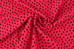 Lycra – Black dots on coral pink