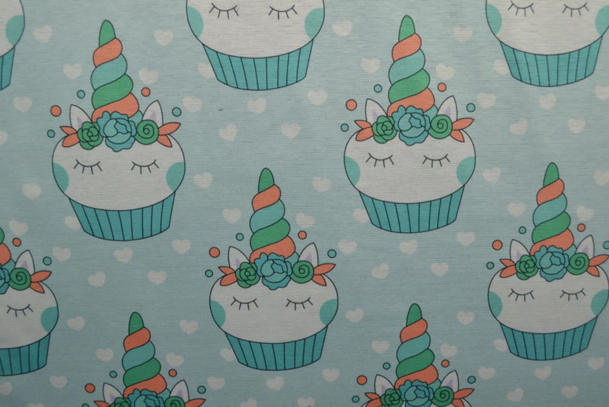 Sweaterstof / Jogging alpenfleece – Eenhoorn cupcakes babyblauw