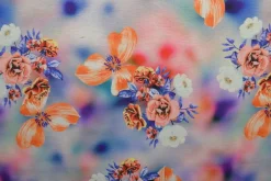 Sweaterstof / Jogging alpenfleece – Kleurrijke bloemen