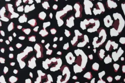 Travelstof – Brown & white animals dots on black