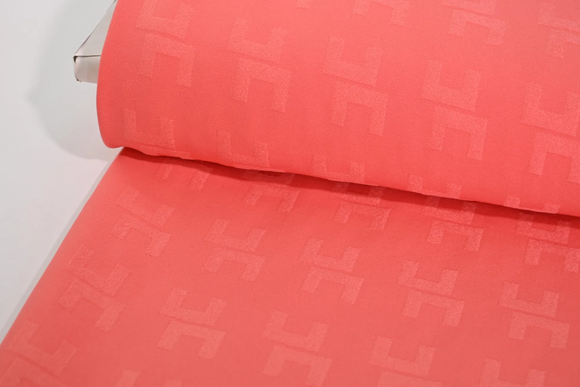 Travelstof – Koraalroze jacquard