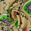 Viscose – Fruity flowers green and salmon on beige