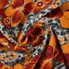 Viscose – Red and orange flowers on jaguar