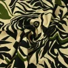 Viscose tricot – Jungle noir olive on champagne