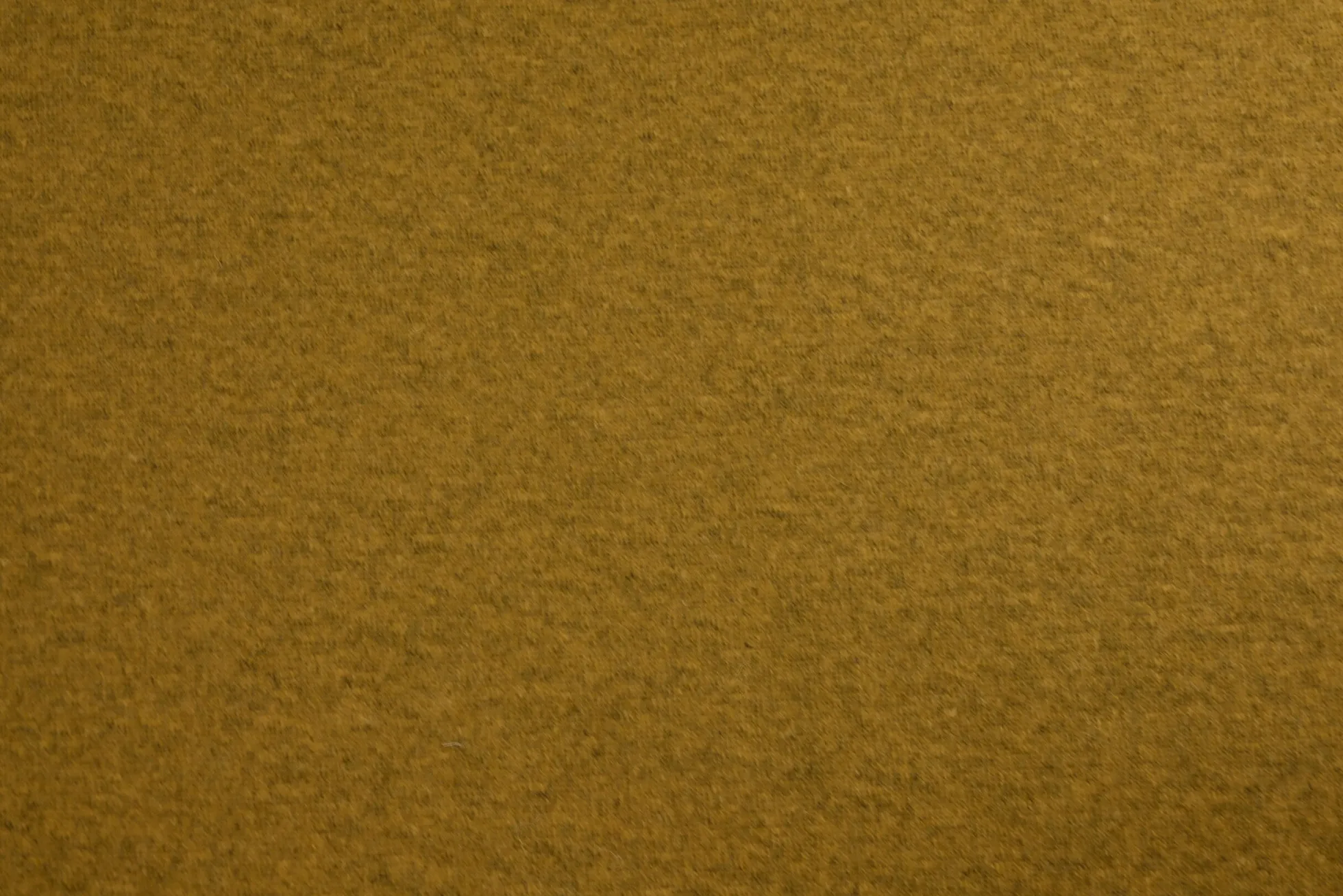 Wol jersey – Donker okergeel melange